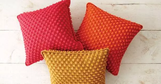 Knit crocheted cozy pillows with popcorn pattern