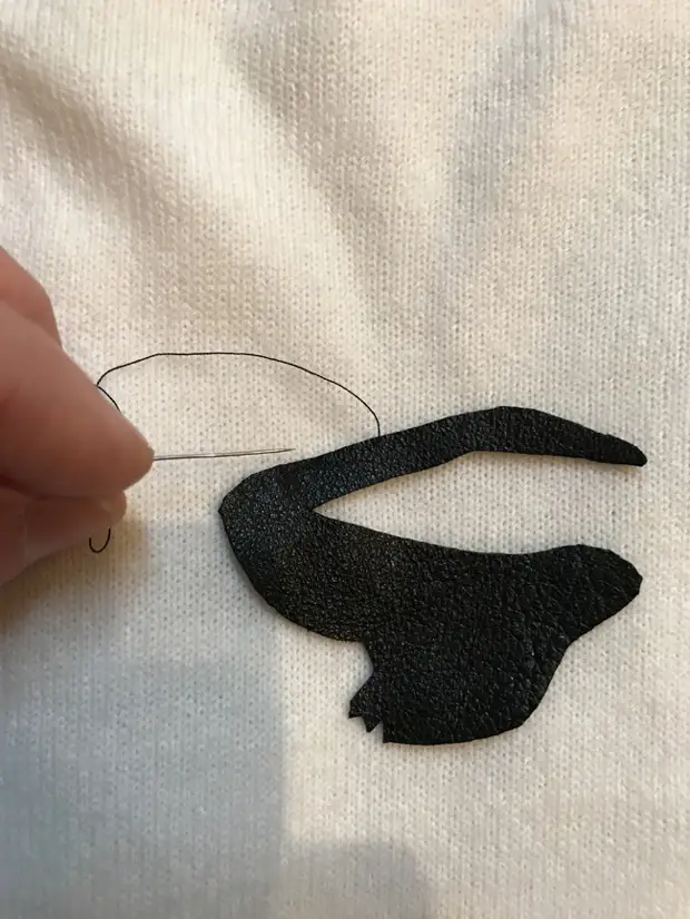 Applique originale di pelle con le loro mani