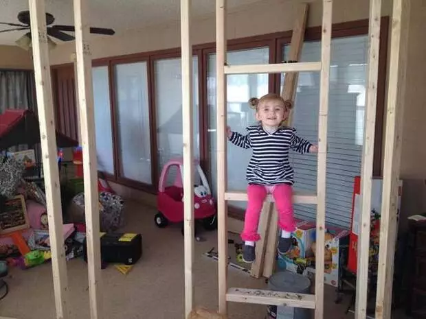 Thoughtful and loving father built a small house for kids inside the room