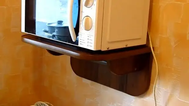 Ang estante sa dingding sa ilawom sa microwave gikan sa kamatuoran nga sa imong kamot