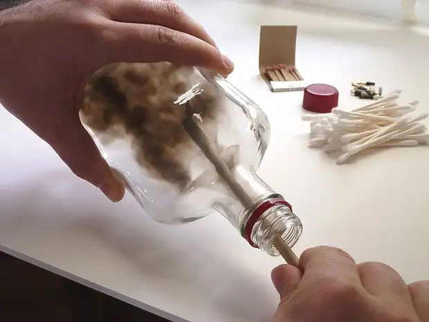 Drawings smoke inside bottles