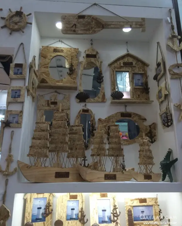 Ev e ku craftên Chineseînî çi dikin: souvenirs û kelûpelên ji OSB