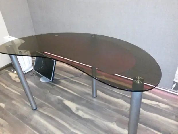 Table with adjustable height and tilt countertops