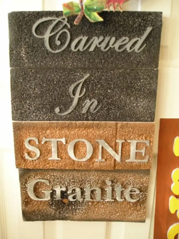 Imitacija slova na granitu