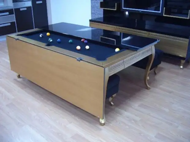 La tablo por bilardo, kiu en nur kelkaj sekundoj igas luksan manĝotablon.