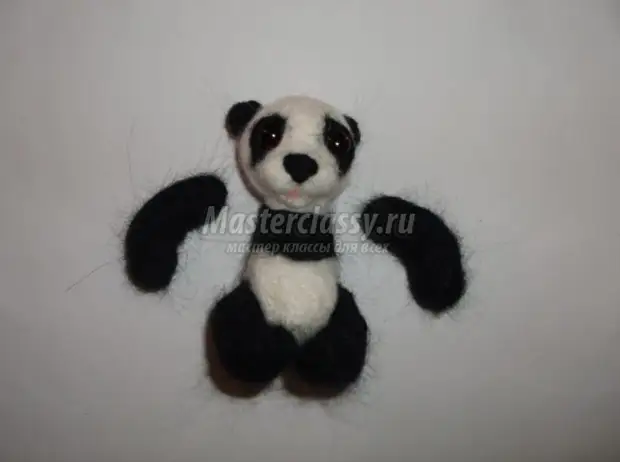Fehlerhaft aus Wollspielzeug. Panda