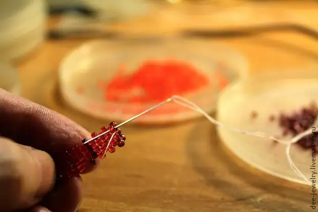 Learning to weave the beads figure mosaic