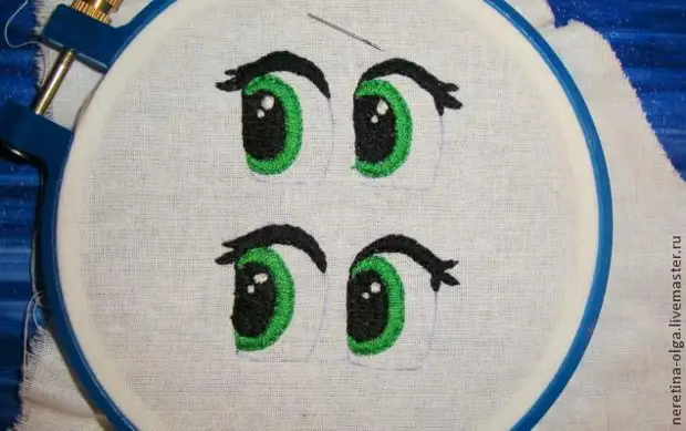 Embroider eyes for knitted toys