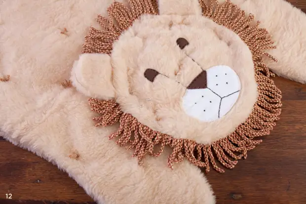 Teddy rug fil-forma ta 'ġlud tal-iljun għall-kamra tat-tfal