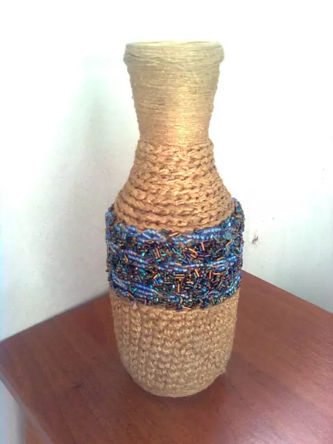 Vase van wynbottels.