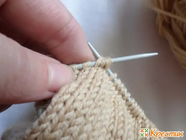 Knitting sweaters with funny teddy bear for children up to year