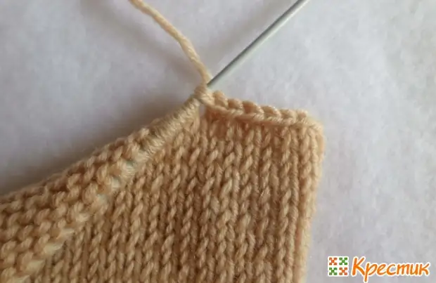 Knitting sweaters with funny teddy bear for children up to year