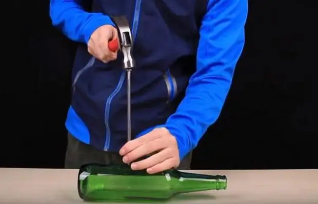 How to pierce a glass bottle with a nail so that it does not cracked and did not burst