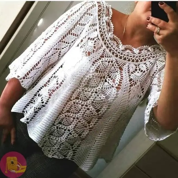 Openwork blusa bere edertasunarekin gogoratzen dena