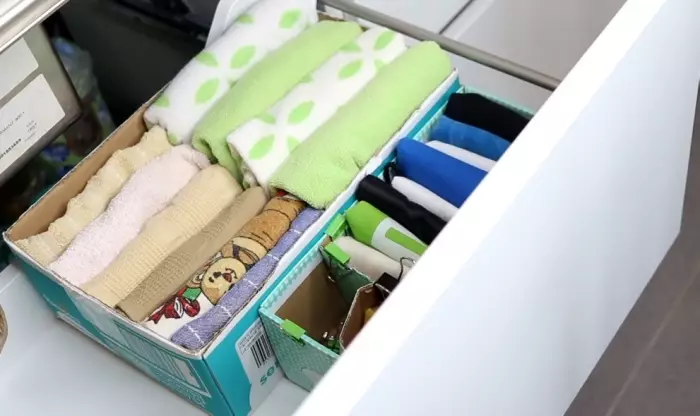 A simple shoe box helps streamline storage of things.