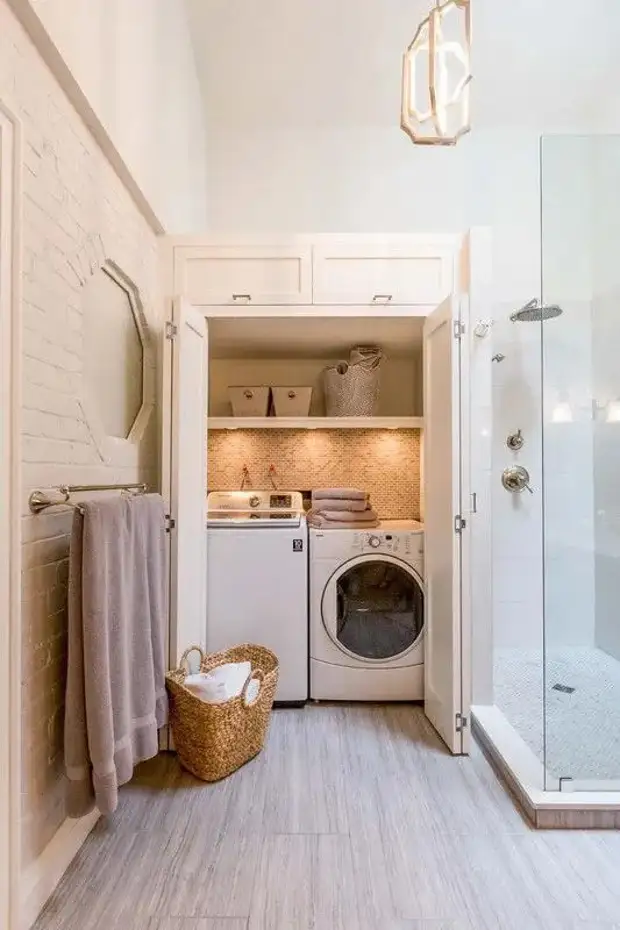 13 ways to imperibly hide the washing machine in the bathroom. Interesting solutions