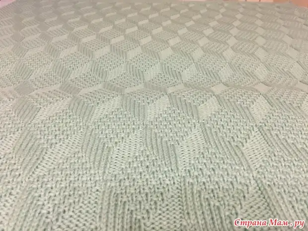 Unusual plaid with 3D effect knitting