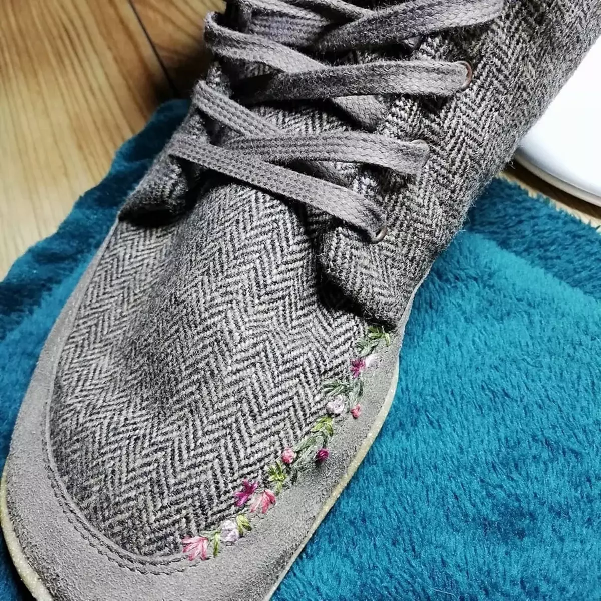 Repair of clothes and shoes as their decoration