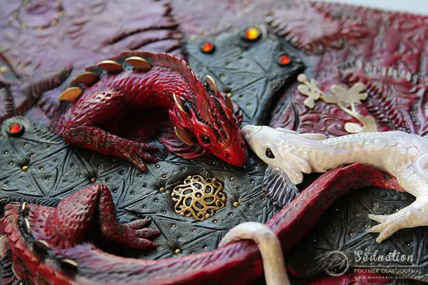 Dragons fabricats amb argila de polímer de l'ànec de mandarina.