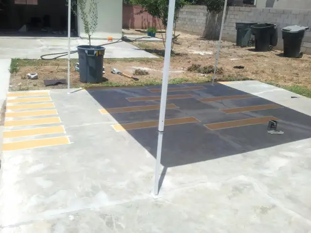 Concrete site painted under the tree with their own hands