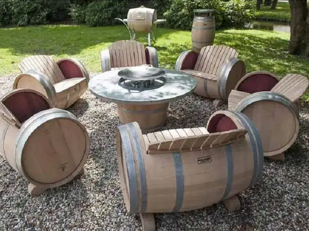 A whole set of chairs from wooden barrels.