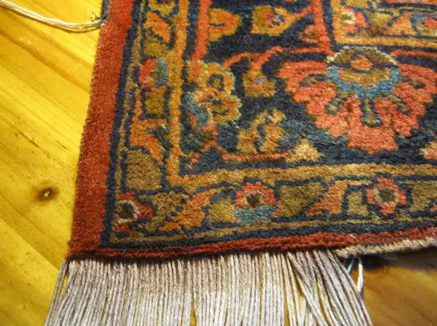 Che aspetto ha il restauro dei tappeti